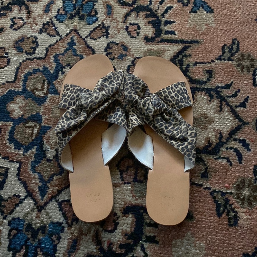 Leopard Cross cross bow slide sandals